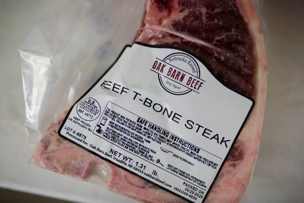Nebraska raised T-bone steak from Oak Barn Beef in packaging ready to eat.  