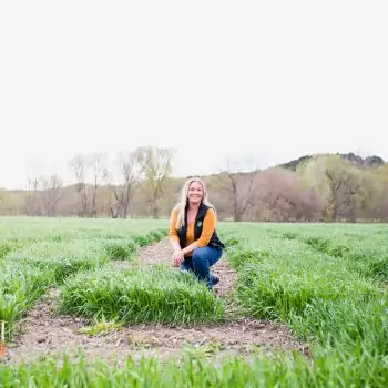 Jami Loecker, problem solver and Agronomy Manager for Syngenta standing in a field in Kansas.