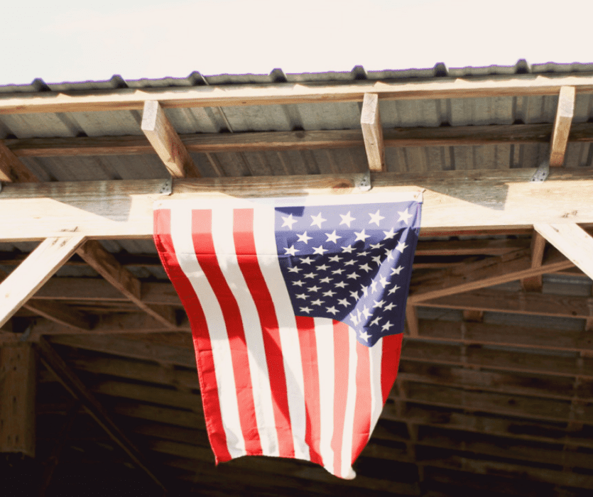 American flag hanging in a barn for Veterans Day.