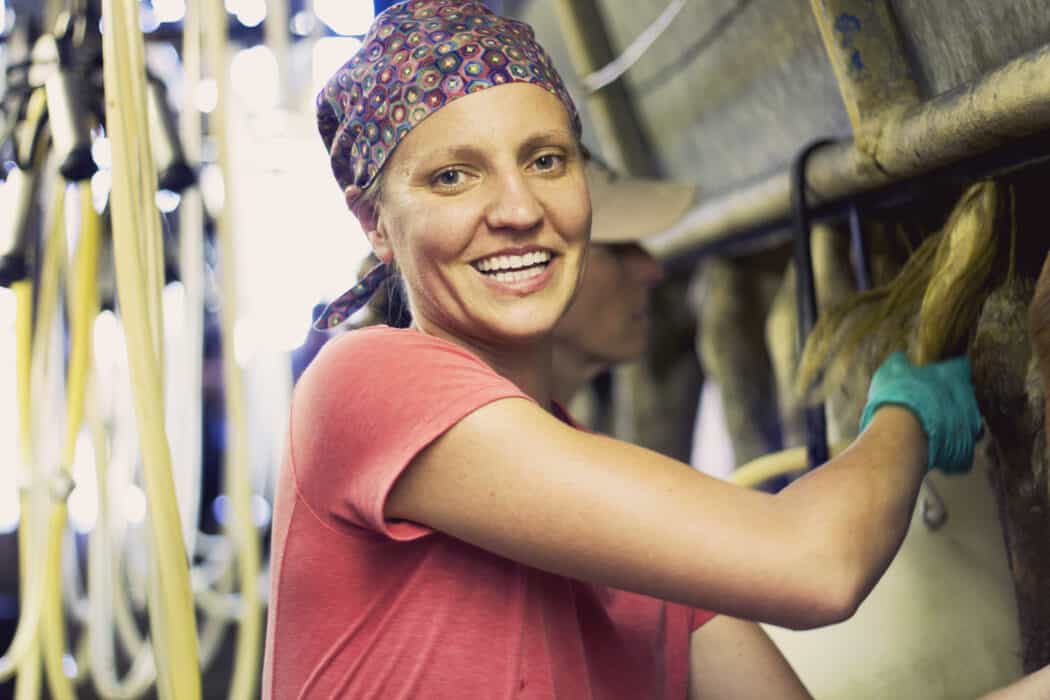 Woman working on family dairy