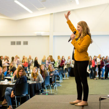 A speaker at a FarmHer event like the Impact Summit
